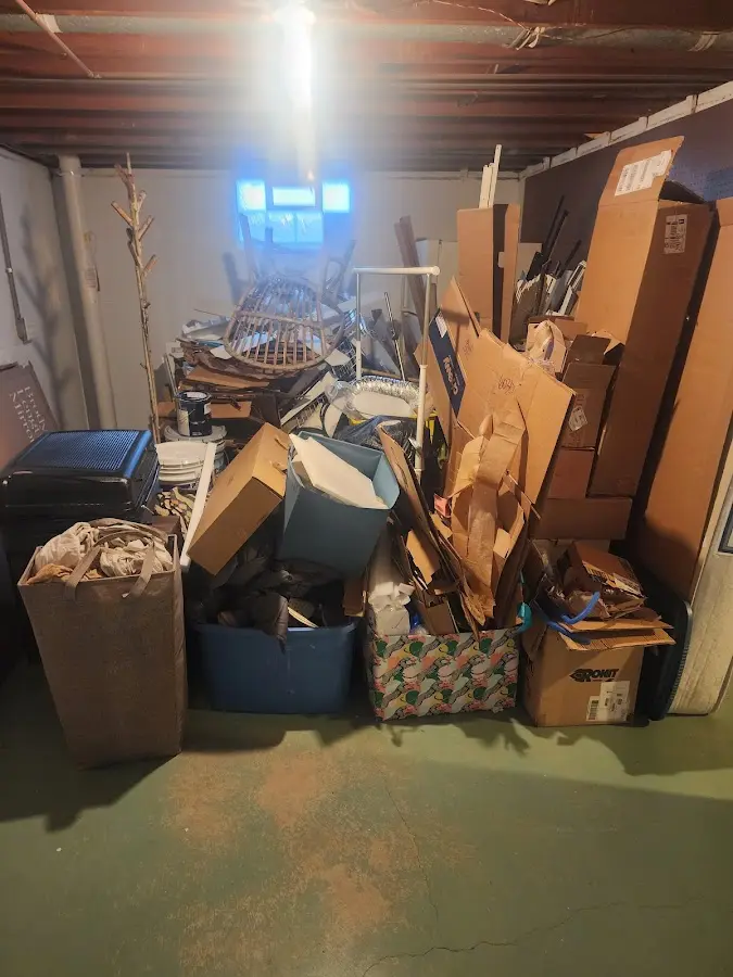 Roll-off dumpster container at job site for Yard Waste Dumpster Rental in Dunstable